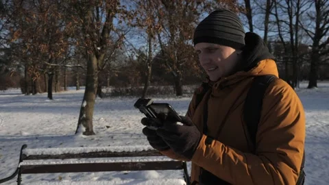 The man is controlling the drone with smartphone Video stock 237115185