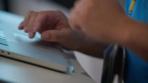 Man controlling his laptop while talking with his hands Stock Footage 92178276