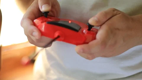 Man controlling the remote control Video stock 87666399