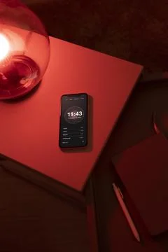 Man controlling smart lamp with his phone Stock Illustration
