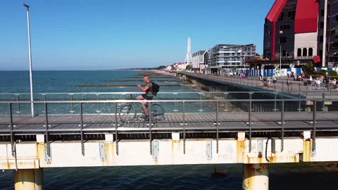 A man controls both the bike and the drone at the same time Stock-Footage 199238499