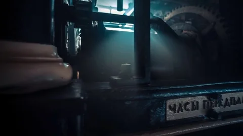 Man Controls Clock Mechanism Video stock 73029032