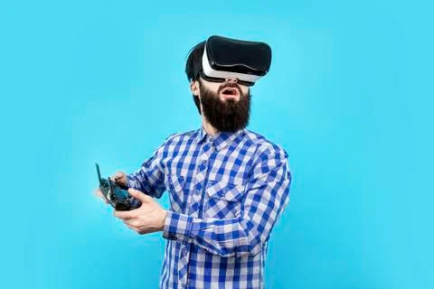 Man controls drone Stock Photos