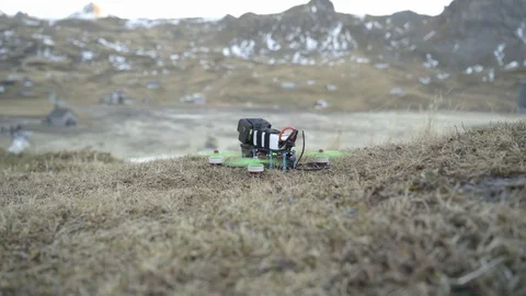 Man controls a drone through a remote control and glasses. Stock Footage 120934150
