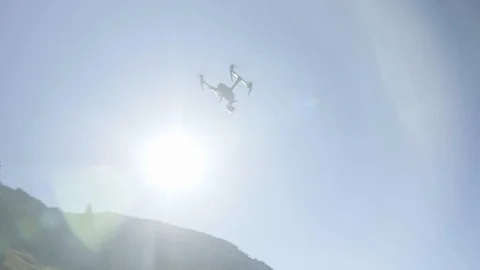 Man controls a drone through a remote control and glasses. Stock Footage 120934710