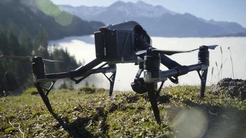 Man controls a drone through a remote control and glasses. Stock Footage 120934764