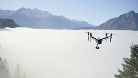 Man controls a drone through a remote control and glasses. Stock Footage 120935115