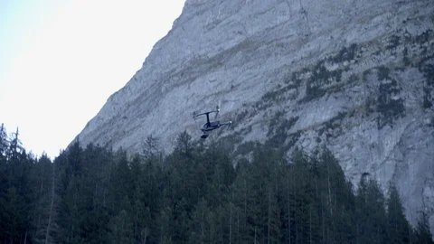 Man controls a drone through a remote control and glasses. Stock Footage 120935516