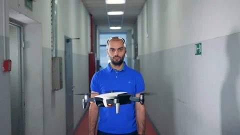 Man controls drone using Brainwave Scanning Headset. Stock Footage 101106159