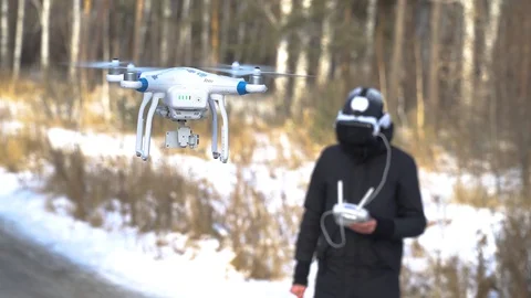 Man controls drones in virtual reality glasses Stock Footage 85672482