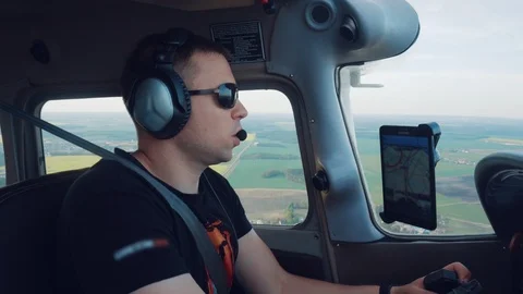 A man controls a plane. Private Jet Stock Footage 126212431