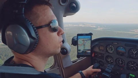 A man controls a plane. Private Jet Stock Footage 126961715