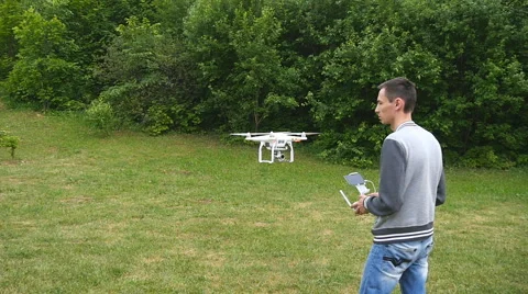 Man controls quadrocopters Stock Footage 63967255
