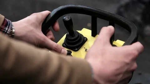 The man controls the remote control levers Stock Footage 81457618