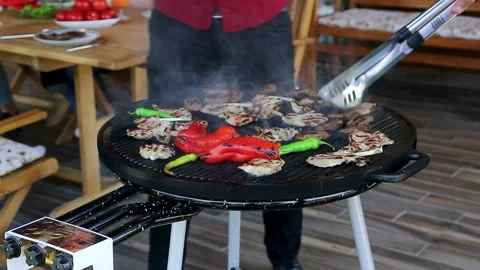 Man Cooking On Barbeque At Home 動画素材 200817247