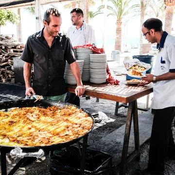 Man cooking biryani Stock Photos