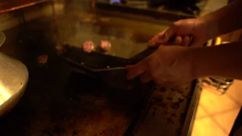 Man cooking Chorizo Stock Footage 142724358