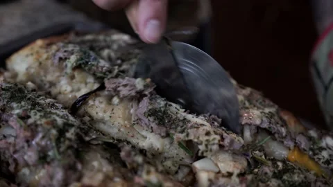 Man Cooking Cutting Lamb Pizza with Pizza Cutter, Closeup Shot Stock Footage 142485991