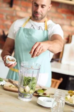 Man cooking Stock Photos
