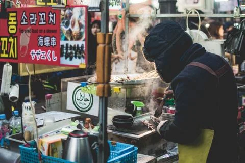Man Cooking in Street Stock Photos