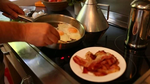 Man Cooking Sunny Side Up Eggs Stock Footage 97442910