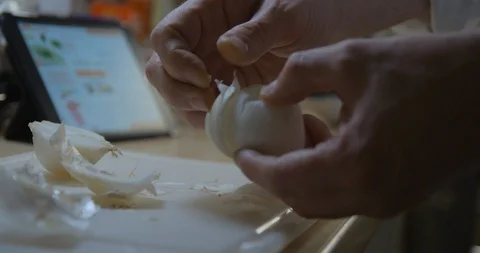 Man cooking with tablet slow motion Stock Footage 85892334