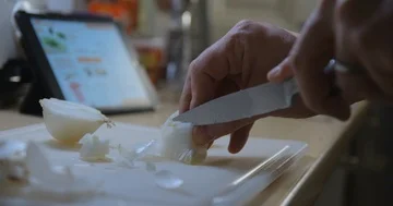 Man cooking with tablet slow motion Stock Footage 85892790