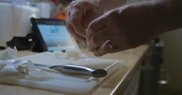 Man cooking with tablet slow motion Stock Footage 85893377