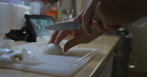 Man cooking with tablet slow motion Stock Footage 85893382