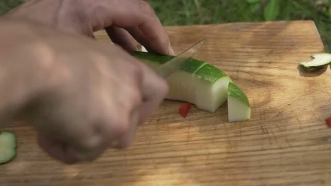 Man cooking zucchini close up 스톡 동영상 80240576