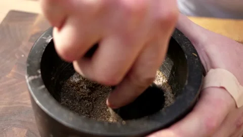 A man cooks fried meat in a pan with sauce and beer. 4K shooting Video stock 131874291