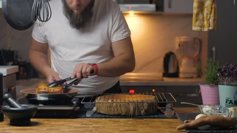 A man cooks at home Video stock 272754209