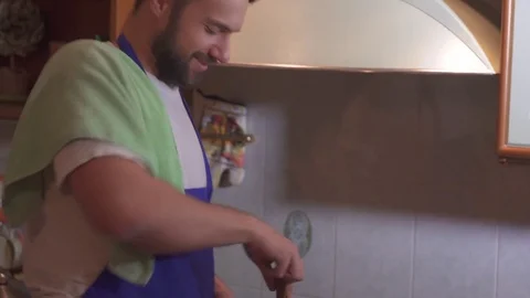 A man cooks in the kitchen Stock-Footage 71642471