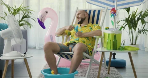 Man cooling himself during a summer heatwave Stock Footage 162380237