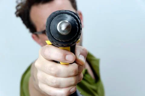 A Man with a cordless screwdriver Stock Photos