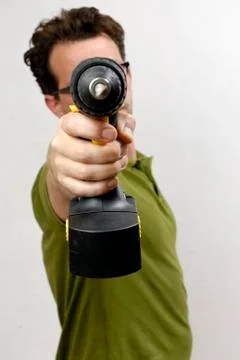 A Man with a cordless screwdriver Stock Photos