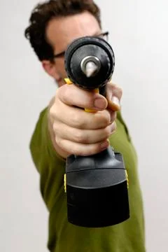 A Man with a cordless screwdriver Stock Photos
