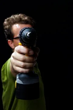 A Man with a cordless screwdriver Stock Photos