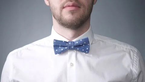 Man Correcting His Bowtie Stock Footage 71374586