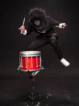 The man in the costume of a monkey. Stock Photos