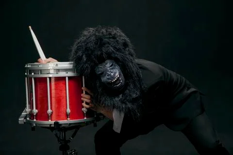 The man in the costume of a monkey. Stock Photos