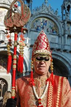Man in costume at st. mark's square during the carnival of venice Stock Photos