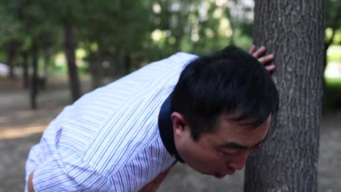 Man coughing and having difficulty breathing Stock Footage 257760777