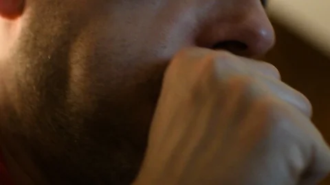 Man coughing at home Stock Footage 125718465