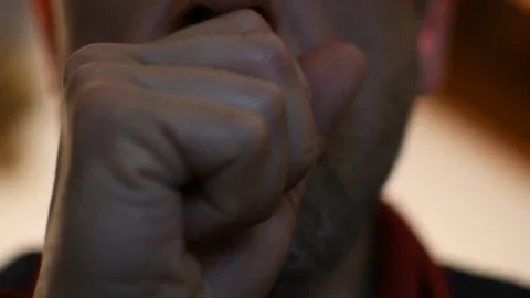 Man coughing at home Stock Footage 125718549