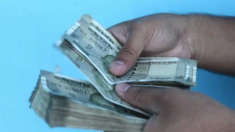 Man counting 500 Indian rupee banknotes Stock Footage 280777910