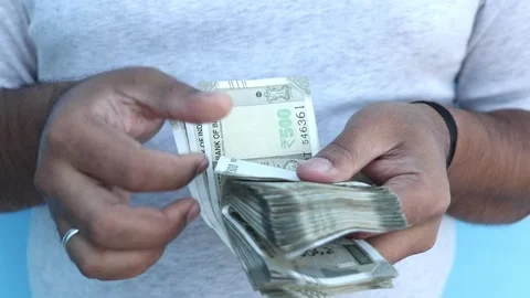 Man counting 500 Indian rupee banknotes Stock Footage 280777918