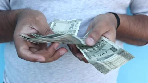 Man counting 500 Indian rupee banknotes Stock Footage 280777928