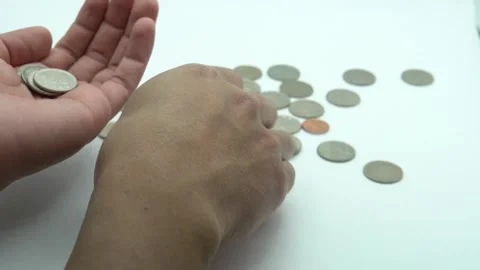 Man is counting coins Stock Footage 233183664