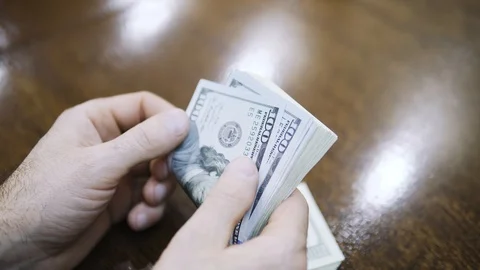 Man counting dollar bills. Close up of male hands count money cash Stock Footage 123153678